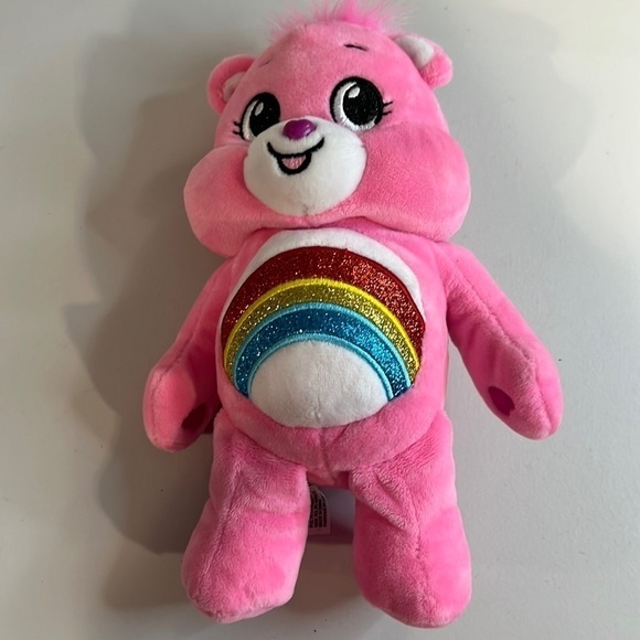 Care Bear Cheer Bear Plush with sparkles on rainbow - Picture 2 of 7